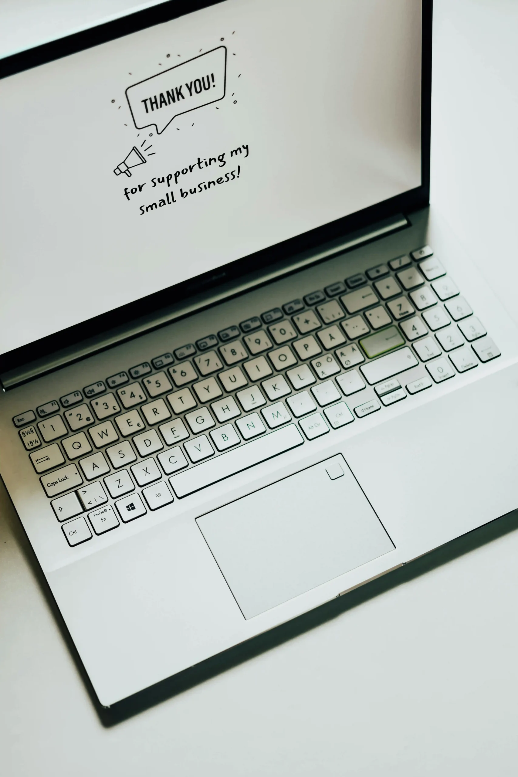 Creative web development studio workspace with laptop and tablet