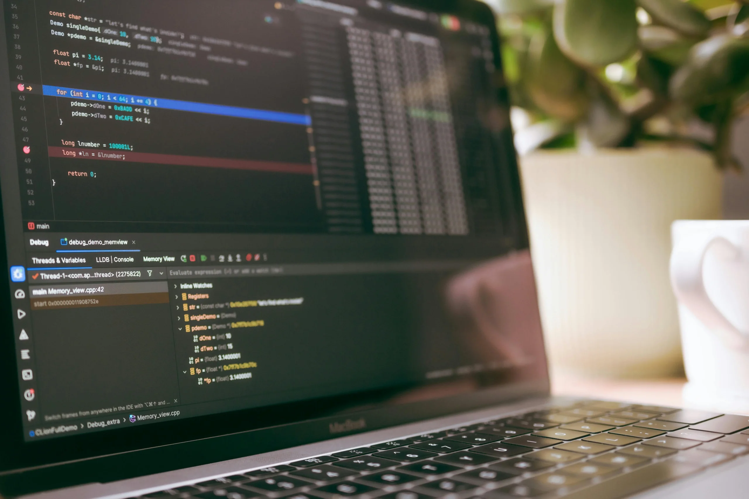 web design company Vancouver developer coding website on laptop screen